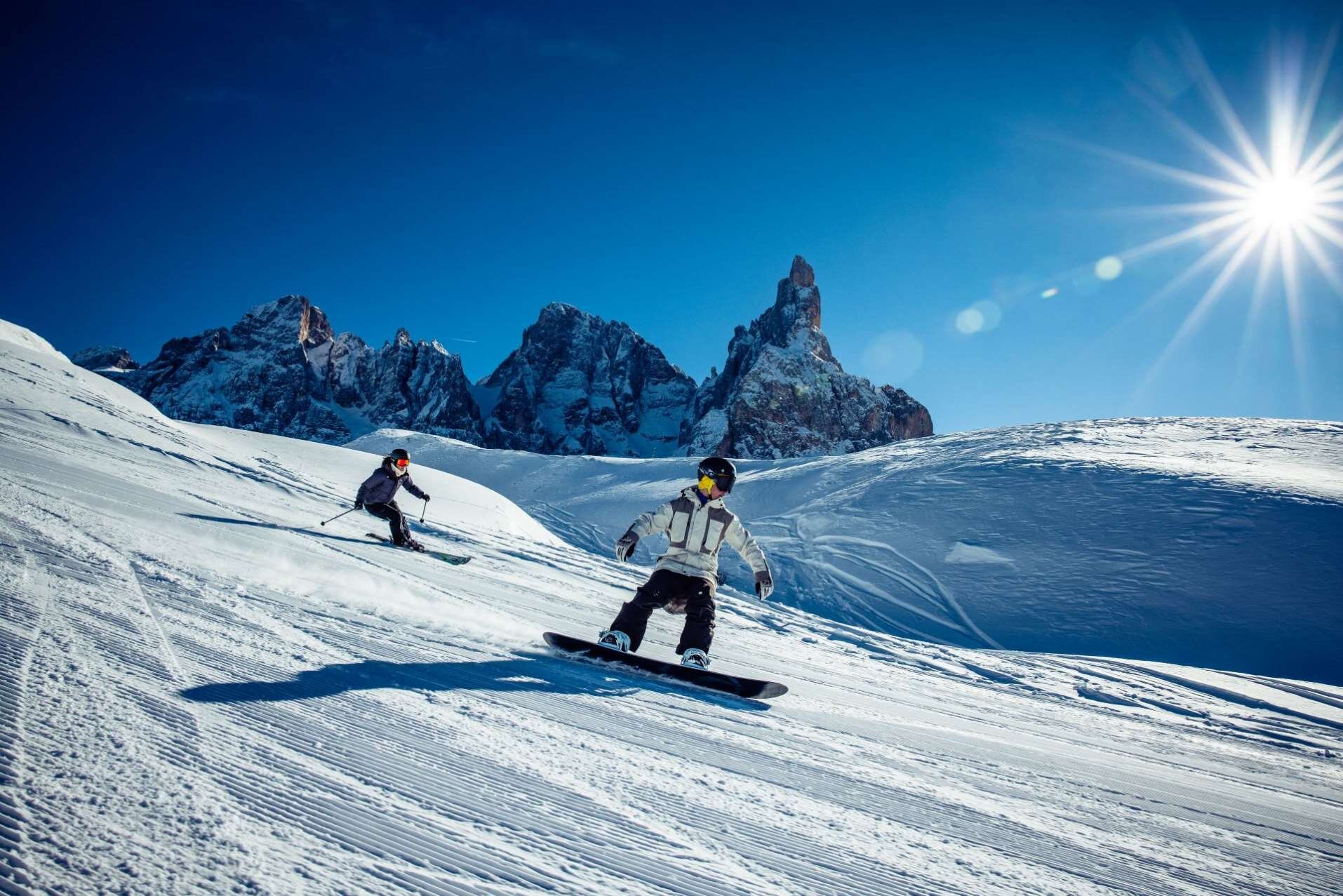 Discesa con lo snowboard sulle piste di San Martino di Castrozza